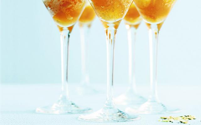 Champagne met kumquats
