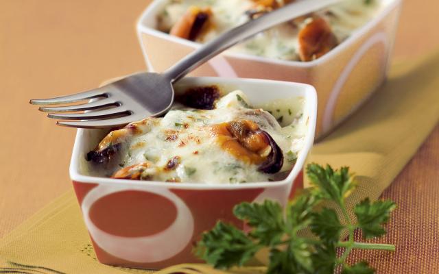 Zeevruchten uit de oven met bechamelsaus
