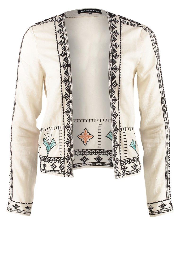 Beige jasje met toffe opdruk - Warehouse (via Zalando) - € 59,95