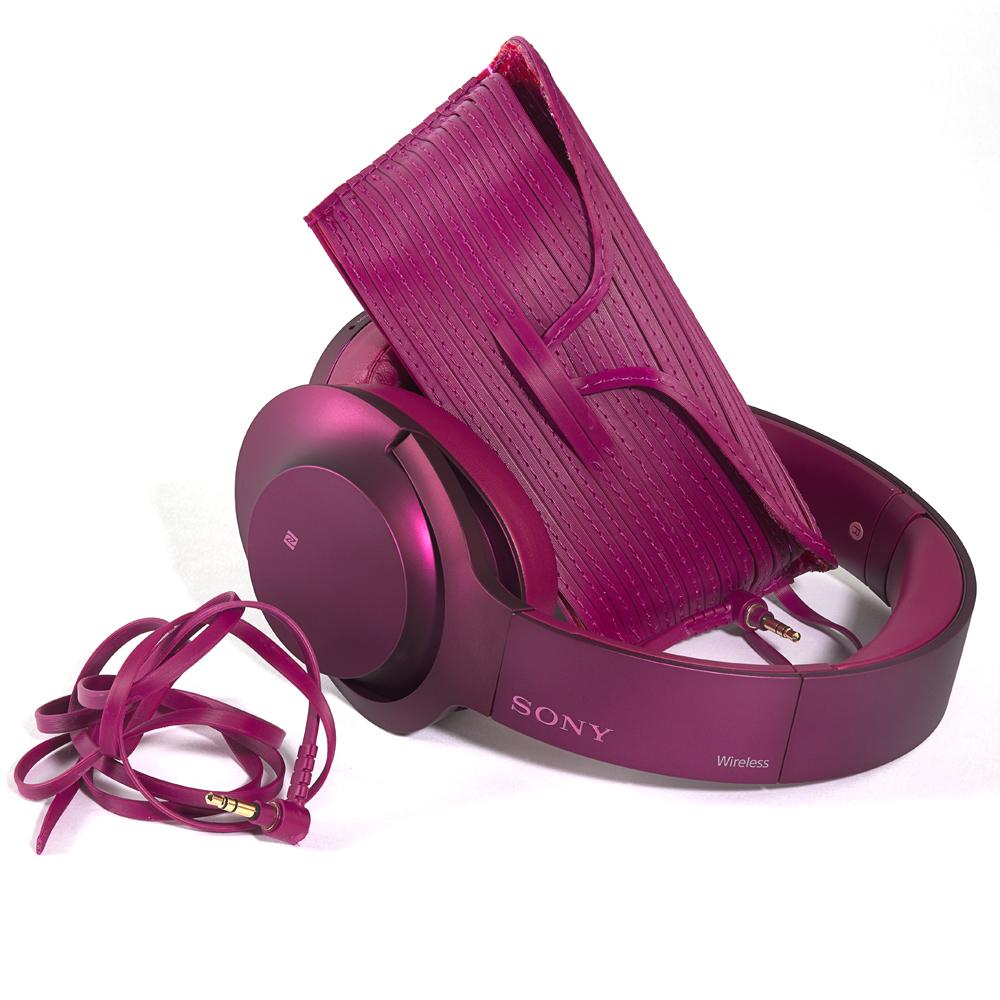 sony h.ear on pink headphones with sunglasses case