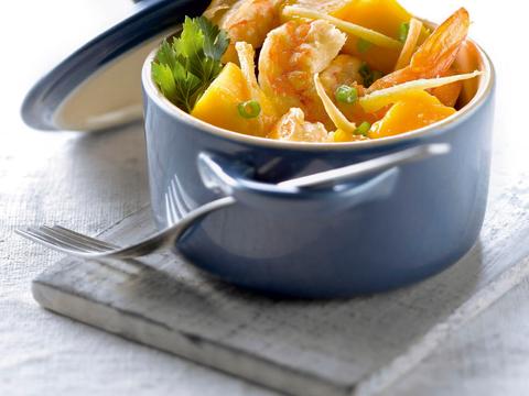 Stoofpotje van scampi's met mango en gember