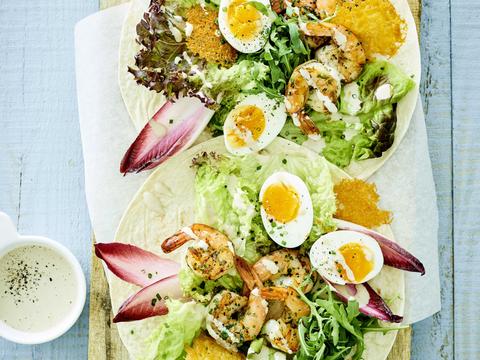 Knoflookscampi met caesarsalade