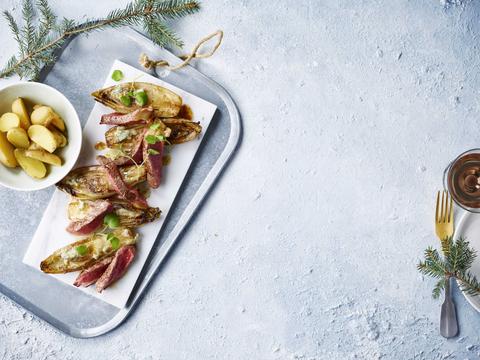 Entrecote met gekaramelliseerd witloof en krieltjes