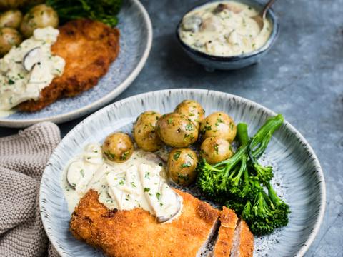 Varkensschnitzel met champignonsaus