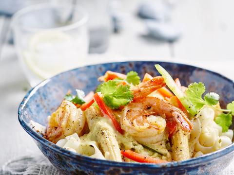 Tagliatelle met scampi's in een kokossausje