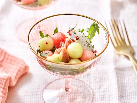 Rucolaslaatje met meloen en ham