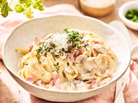 Linguini met champignonroomsaus en pancetta