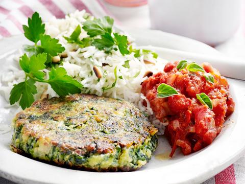 Spinazieburger met tomatensaus en rijst
