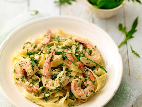 Tagliatelle met scampi's in kruidensaus