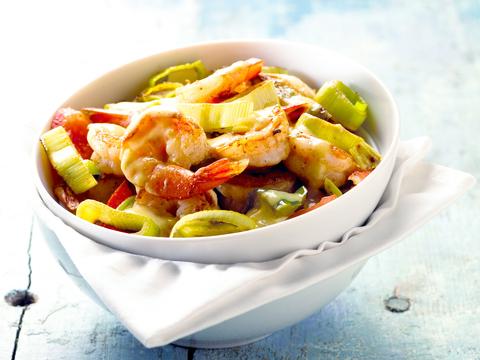Wok van scampi's met kerrie