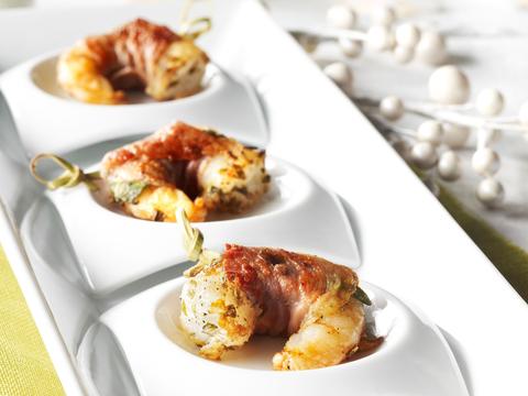 Saltimbocca van scampi’s met salie en ham