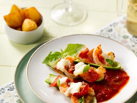 Courgettebootjes met ham en scampi’s