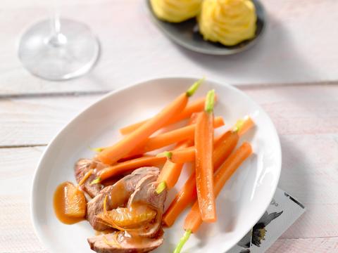 Eend met wortelen in sinaasappelsaus met pommes duchesse