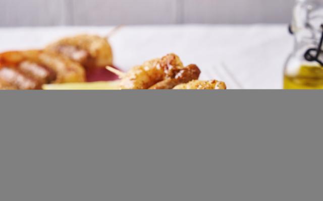 Spiesje van scampi’s en merguez met couscoussalade
