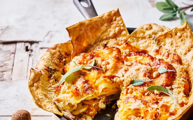 Pompoen- en ­champignonlasagne met geitenkaas