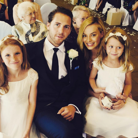 Tom Ackerley (28) en Margot Robbie (27)