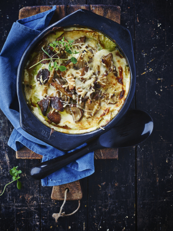 Lasagne van boschampignons en groene kool