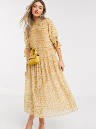 Oversized jurk met korte mouwen en gele en oranje bloemenprint