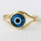 Bague Mauvais Œil (32,19 €, sur Etsy.com).
