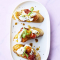 Bruschetta met geroosterde kerstomaatjes en burrata