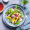 Voorgerecht: sinaasappelsalade met granaatappel en amandelen