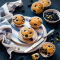 Muffins met blauwe bessen en witte chocolade