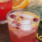 Veenbessencocktail met rode bessen en sinaasappel