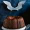 Chocoladekerstcake met kweepeerglazuur