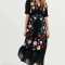 Zwarte maxi-jurk met geborduurde bloemen