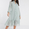 Oversized jurk met ballonmouwen in saliegroen