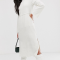 Witte midi-jurk met split en lange mouwen