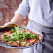 Kikkererwtenpizza met rucola (4 personen)