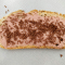 Une tartine au pâté et des crottes de souris en chocolat