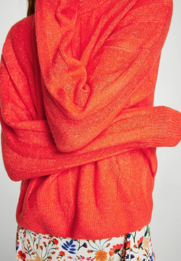 Pull en côte orange