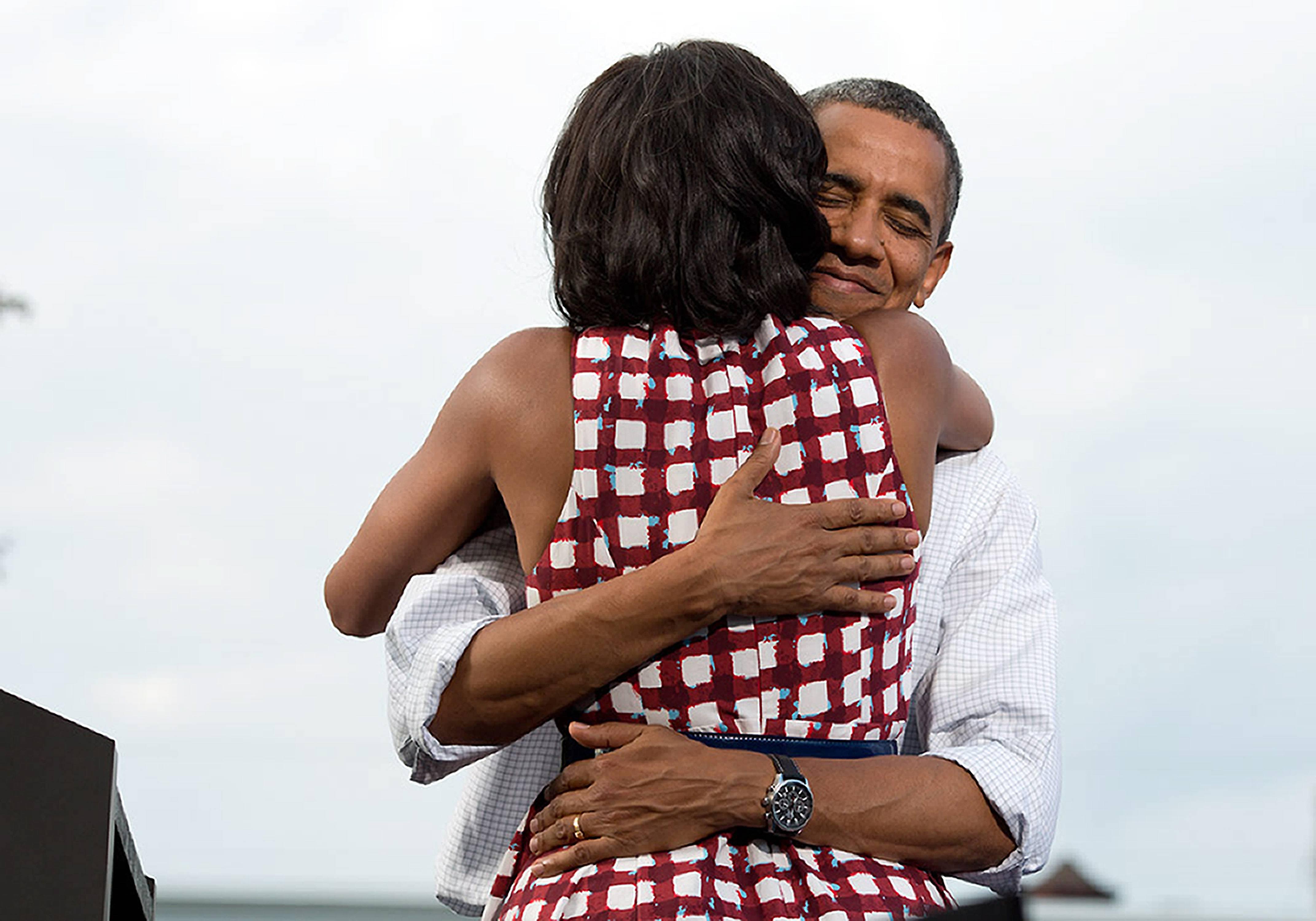 Aug. 15, 2012."The President hugs the First Lady after she had introduced him at a campaign event in Davenport, Iowa. The campaign tweeted a similar photo from the campaign photographer on election night and a lot of people thought it was taken on election day."  CAP/ADM/CNP/PS ©Pete Souza/CNP/AdMedia/Capital Pictures Reporters / Capital Pictures