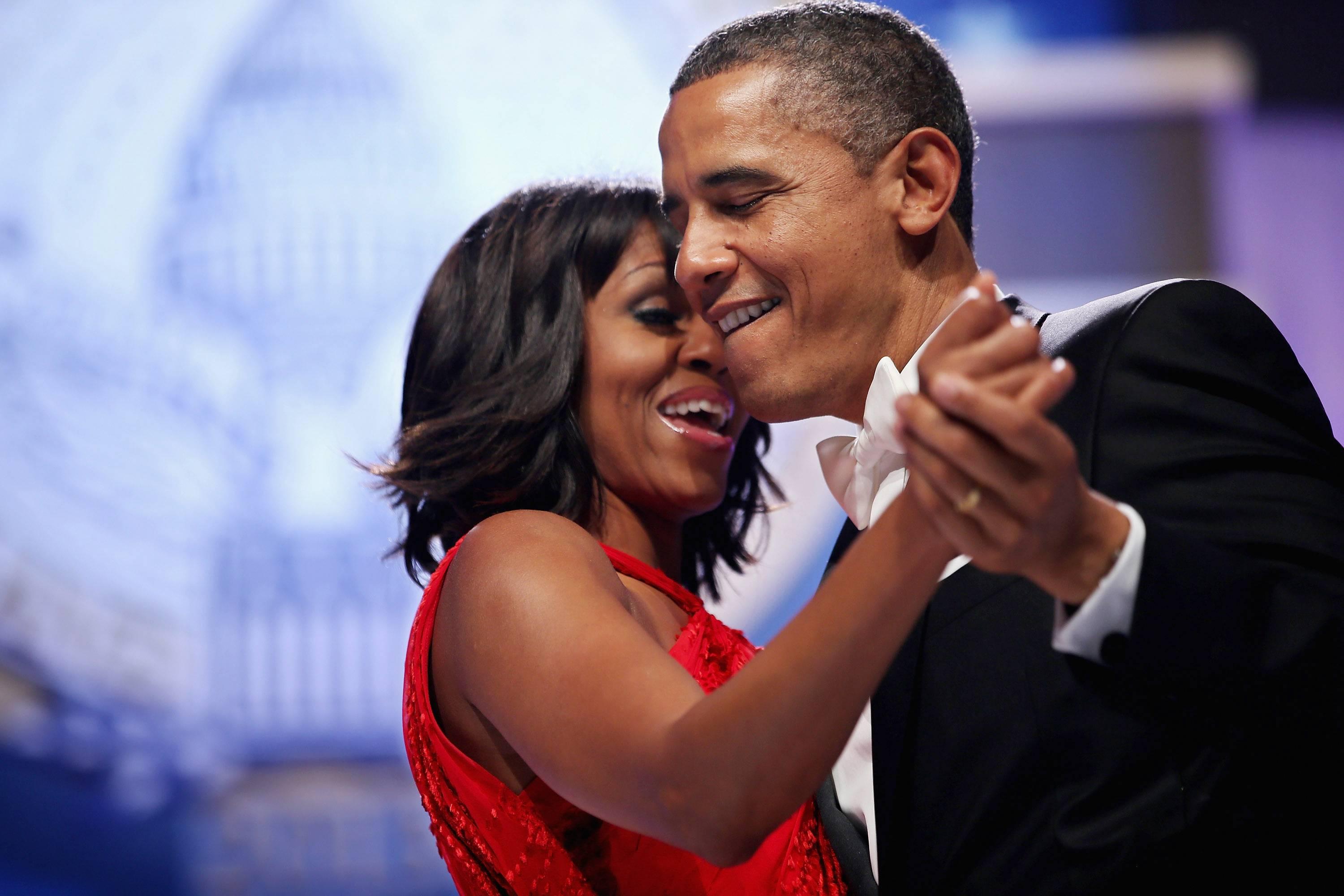 United States President Barack Obama and first lady Michelle Obama sing together as they dance during the Inaugural Ball at the Walter Washington Convention Center January 21, 2013 in Washington, DC. President Obama started his second term by taking the Oath of Office earlier in the day during a ceremony on the West Front of the U.S. Capitol. .Credit: Chip Somodevilla / Pool via CNP Reporters / DPA