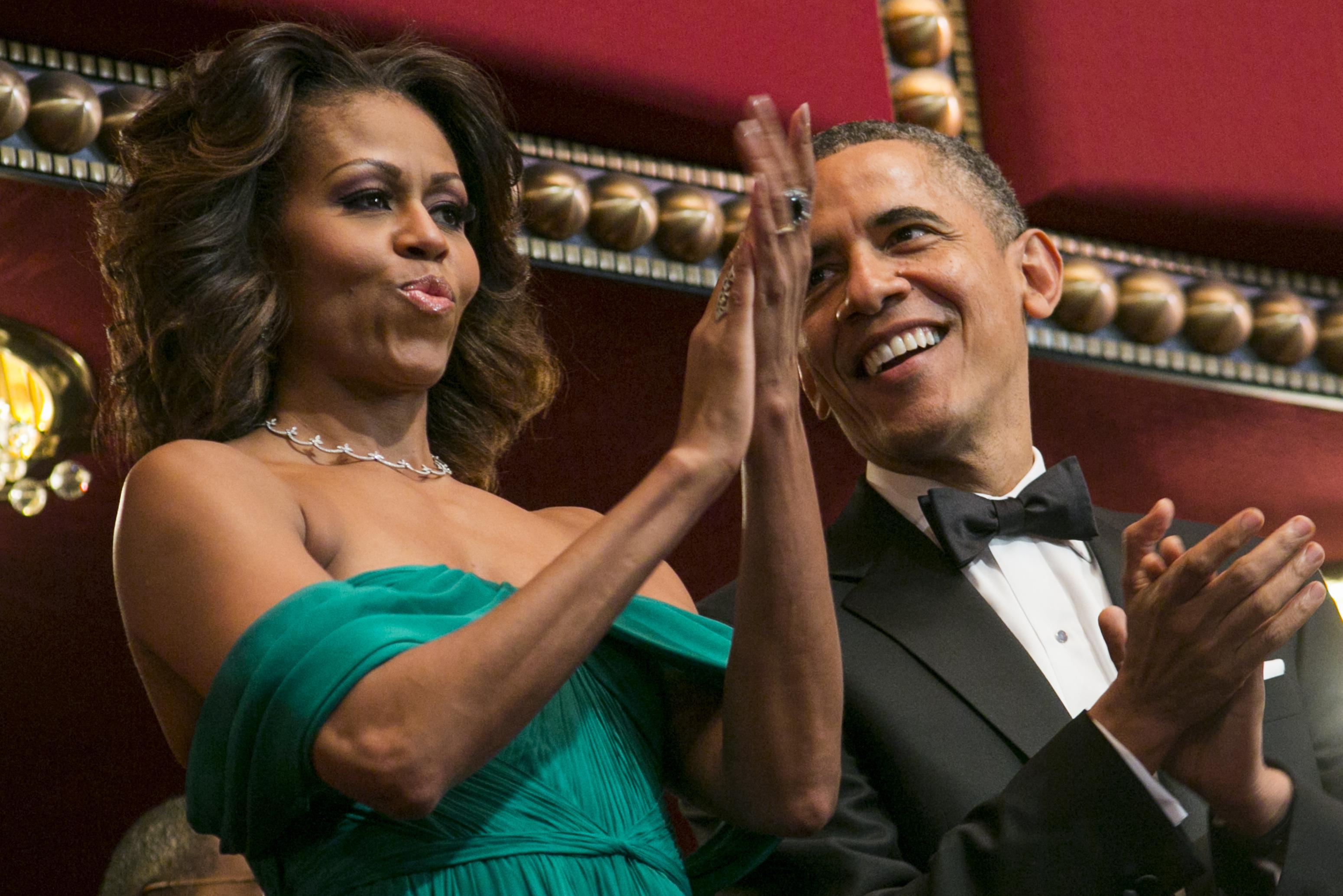 United States President Barack Obama and First Lady Michelle Obama attend the 2013 Kennedy Center Honors on December 8, 2013 in Washington, DC, USA. Photo: Kristoffer Tripplaar/Sipa Press via CNP Reporters / DPA