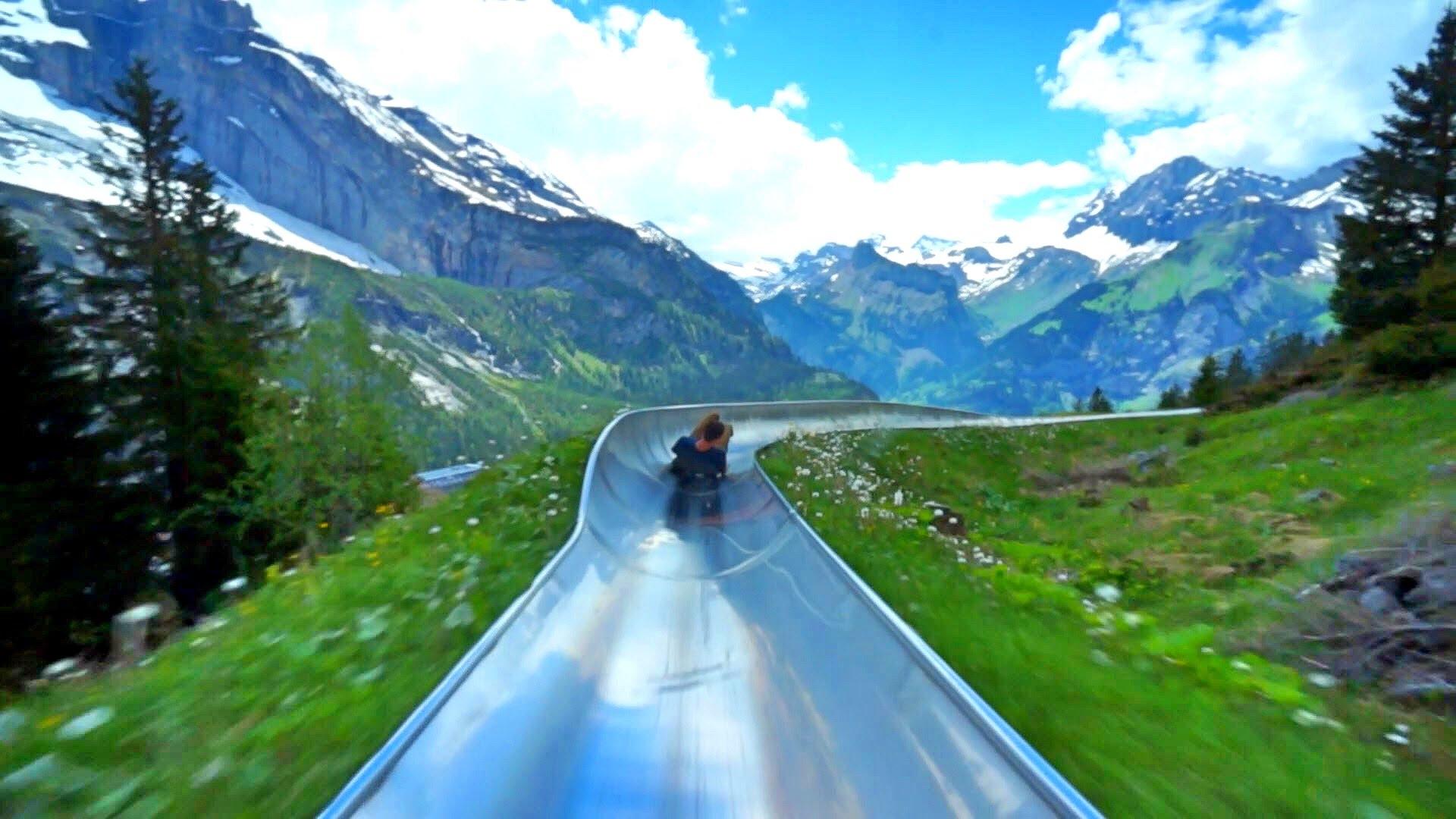 In deze rodelbaan in de Zwitserse Alpen willen wij weleens een ritje maken