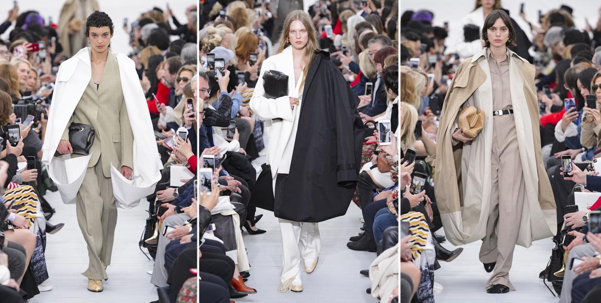 Phoebe Philo gooide enkele loopy trenchcoats over mannelijke suits bij Céline tijdens de SS18 show.