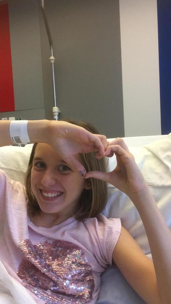 Elle blijft moedig en vrolijk.