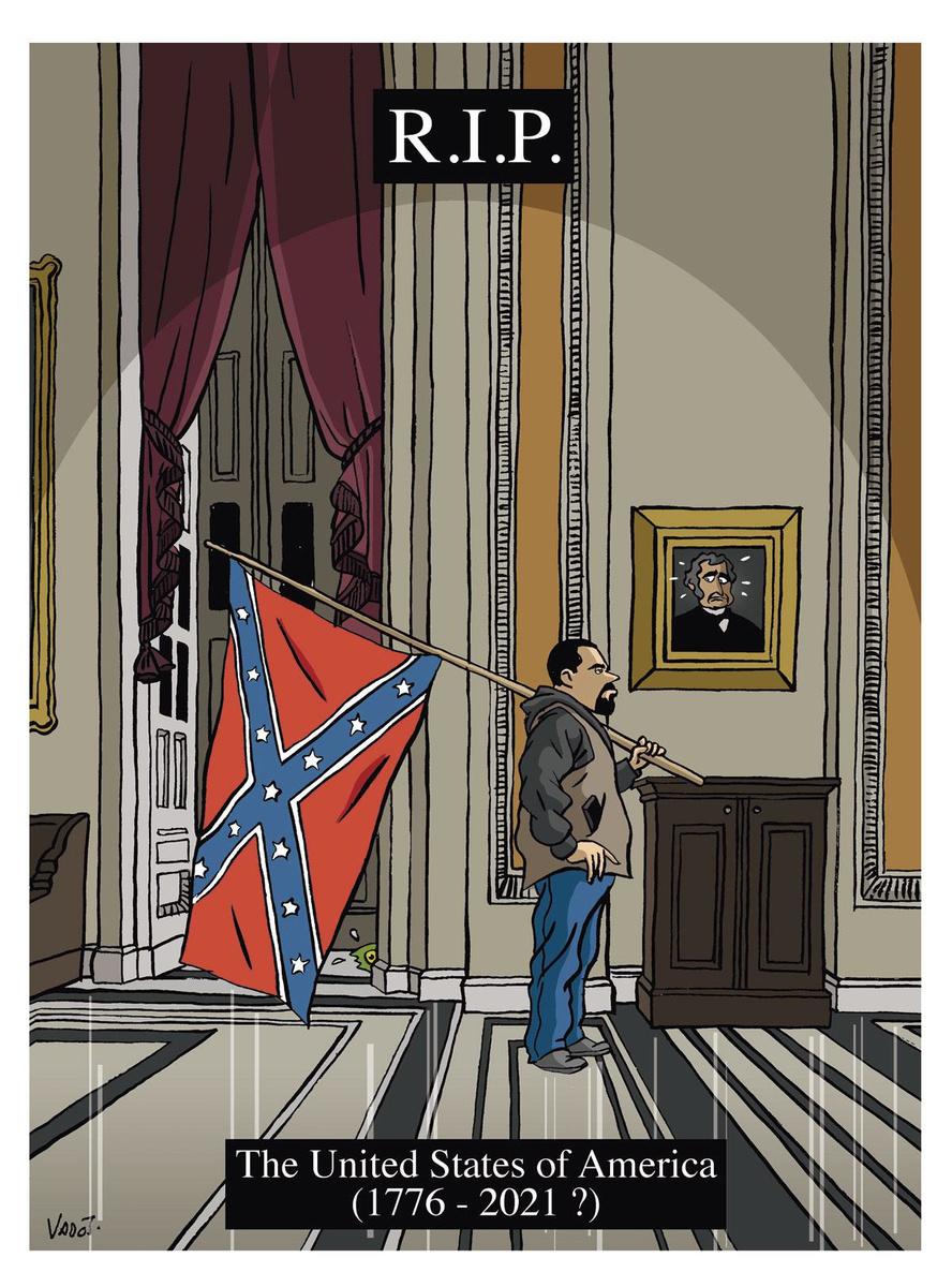 14 janvier Des militants pro-Trump envahissent le Capitole. Dont l'homme au drapeau confédéré, symbole du suprémacisme blanc.