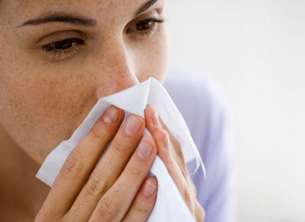 De symptomen van een verkoudheid 