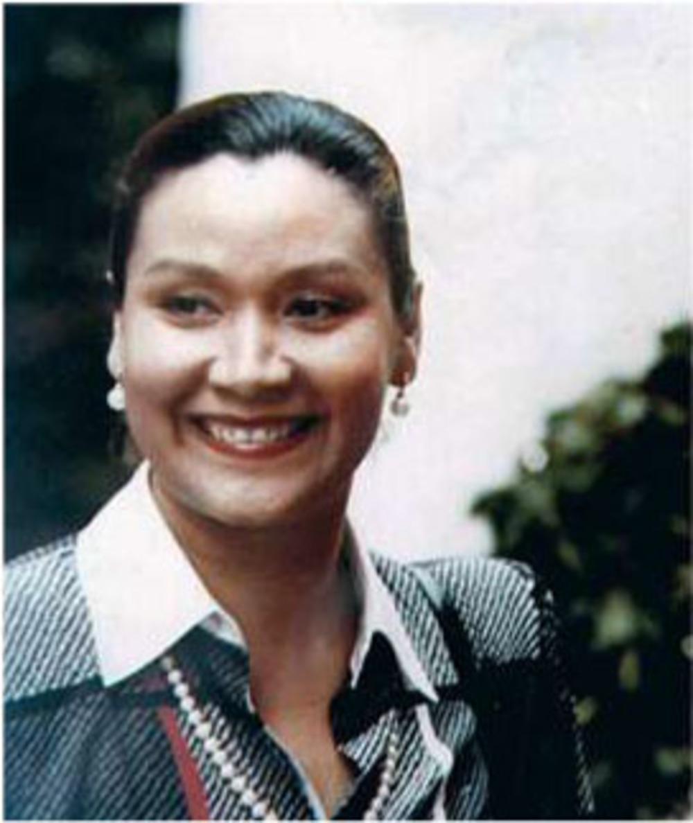 Zijn vrouw, Gladys Meza Romero.