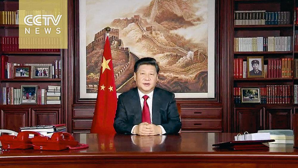 President Xi tijdens zijn nieuwjaarstoespraak. 'Zoals Amerika gelooft in advocaten, gelooft China in ingenieurs.'