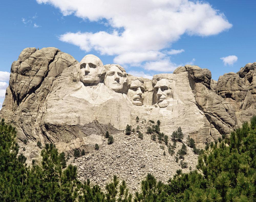 Mount Rushmore, met helemaal links George Washington, de eerste democratisch verkozen president. Napoleon was het Amerikaanse model genegen, maar achtte het in de Europese context onwerkbaar.
