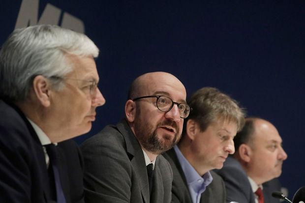  Charles Michel (MR) samen met Didier Reynders, Olivier Chastel en Willy Borsus op de persconferentie van 18 februari.