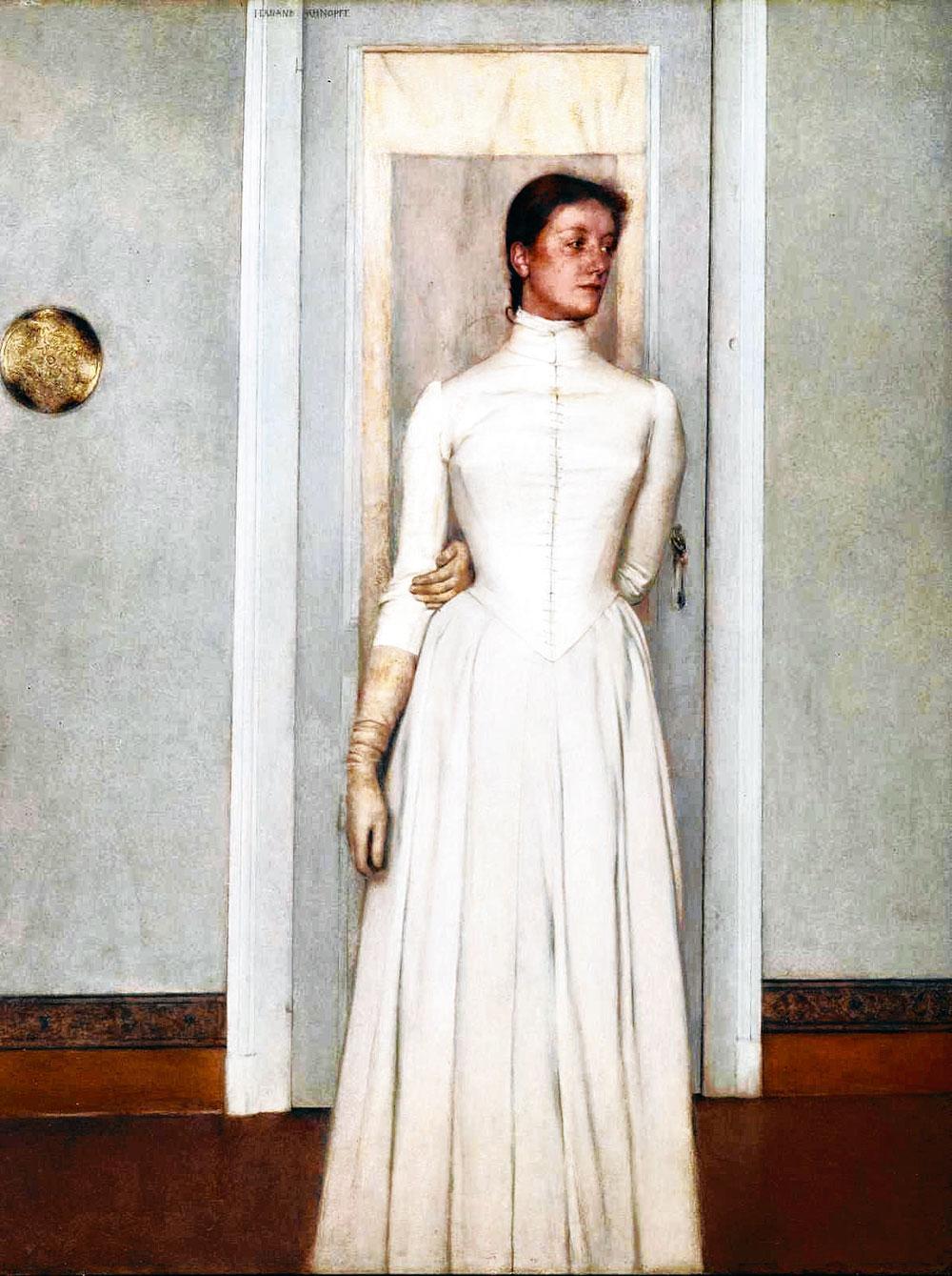 Fernand Khnopff, Portrait de Marguerite (1887) Zijn zus stond model voor de meeste vrouwelijke figuren in zijn werk: de maagd, de engel, de godin, het 'eeuwig vrouwelijke'.