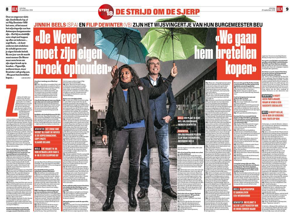 Jinnih Beels (SP.A) en Filip Dewinter (Vlaams Belang) 'Dewinters brede grijns verraadt dat hij ter plaatse de politieke betekenis van het beeld al begrepen had.'