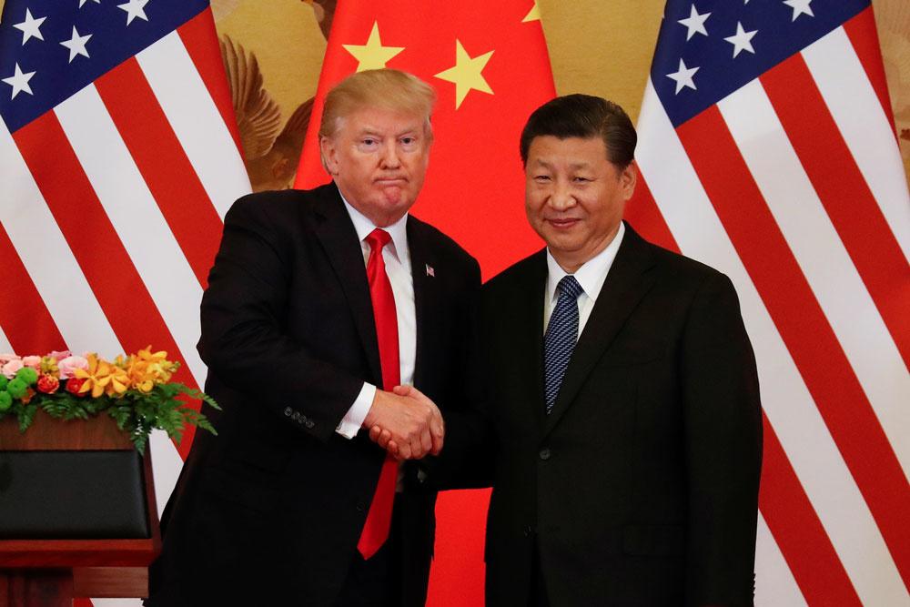 De Amerikaanse president Donald Trump en de Chinese president Xi Jinping, in pre-coronatijden