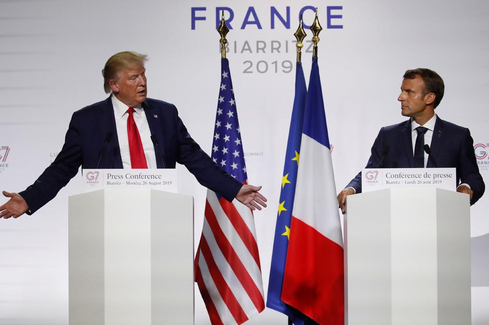 Donald Trump en Emmanuel Macron tijdens een persconferentie aan het einde van de G7.